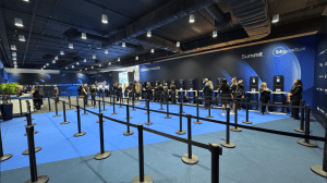 Fotografia da área de credenciamento do evento BTG Summit 2026